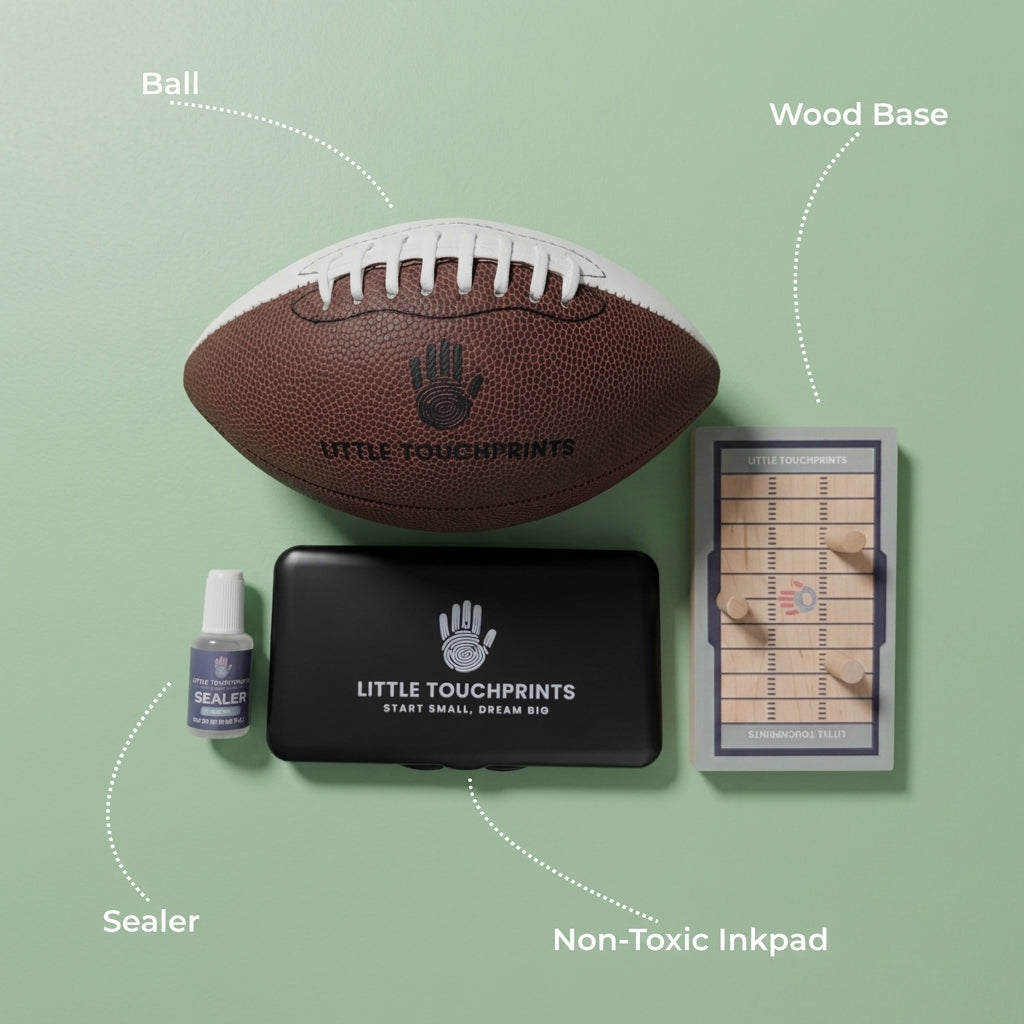Little Touchprints kit contents including ink pad, alcohol wipe, brush-on sealant, and maple display base
