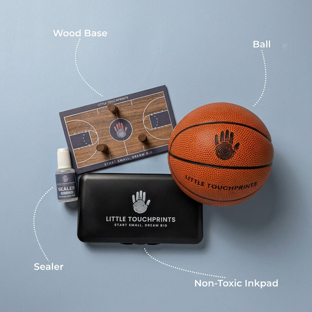 Little Touchprints kit contents including ink pad, alcohol wipe, brush-on sealant, and walnut display base