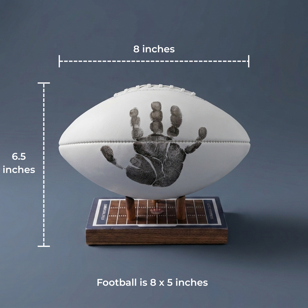 Handprint keepsake football mounted on walnut display base