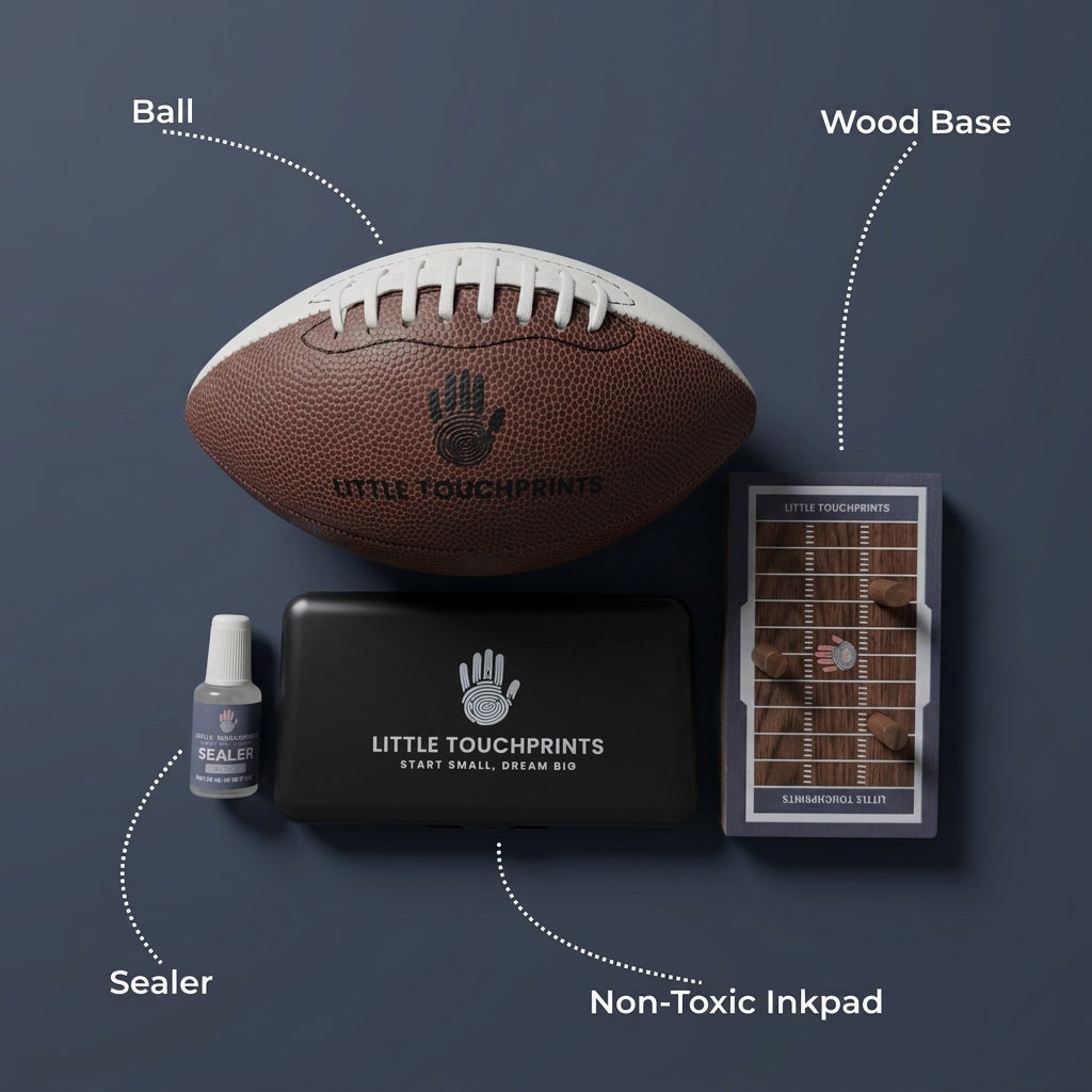 Little Touchprints kit contents including ink pad, alcohol wipe, brush-on sealant, and walnut display base